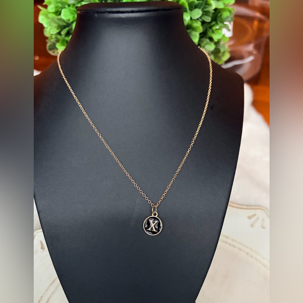 Fashion gold tone necklace with X initial charm